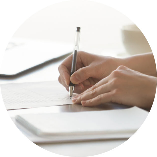 Woman Filling Out Forms